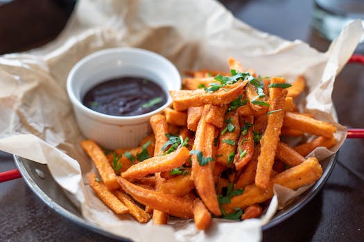 Delicious Sweet Potato Fries Paired with Spicy Sriracha Dip