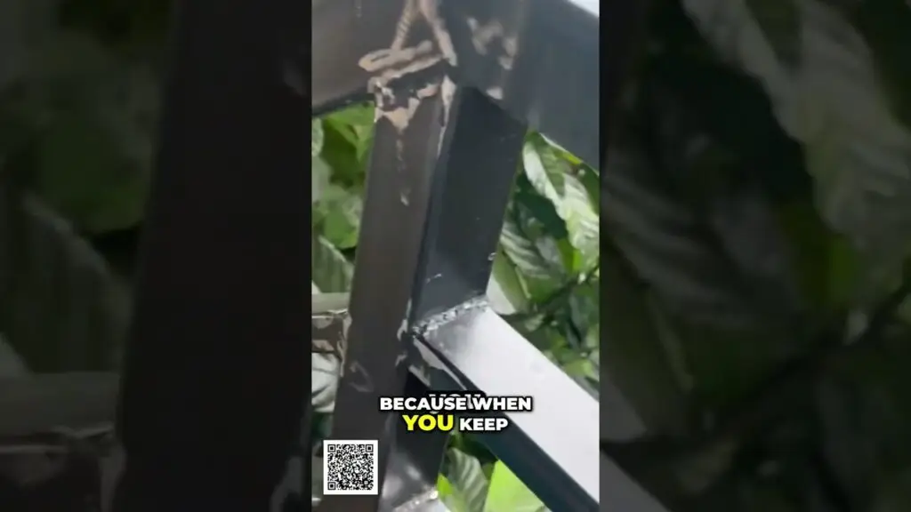 Stop Guessing Build a Business That Works shorts - Travel With Glen Close-up of a welded metal railing corner with plant-filled background; caption reads 'BECAUSE WHEN YOU KEEP' and a QR code appears bottom-left.