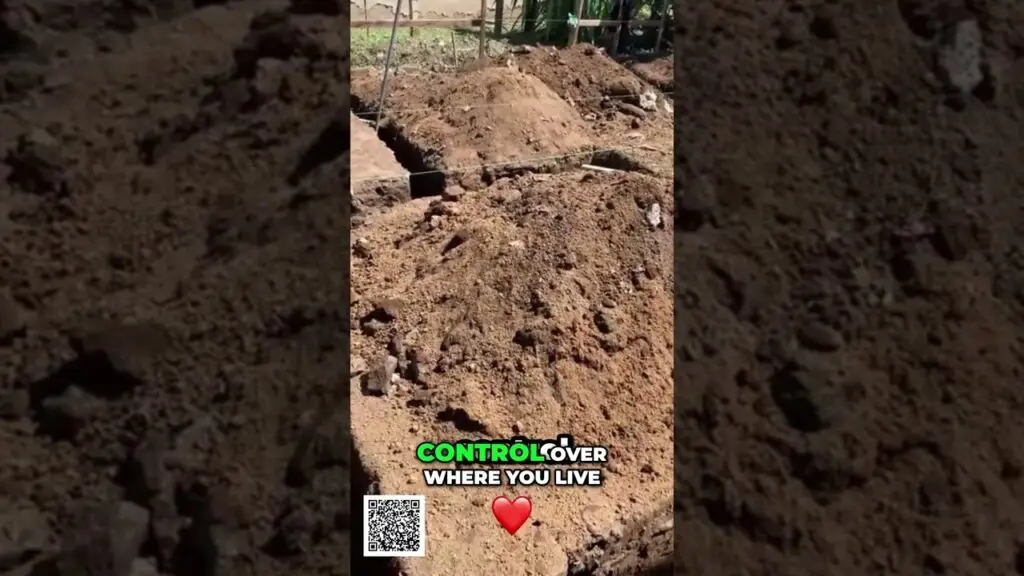 Unlock Financial Freedom Diversify Your Income Streams Now shorts - Travel With Glen Dug trench in a dirt yard with piled soil; on-screen text reads “CONTROL OVER WHERE YOU LIVE” with a red heart and a QR code nearby.