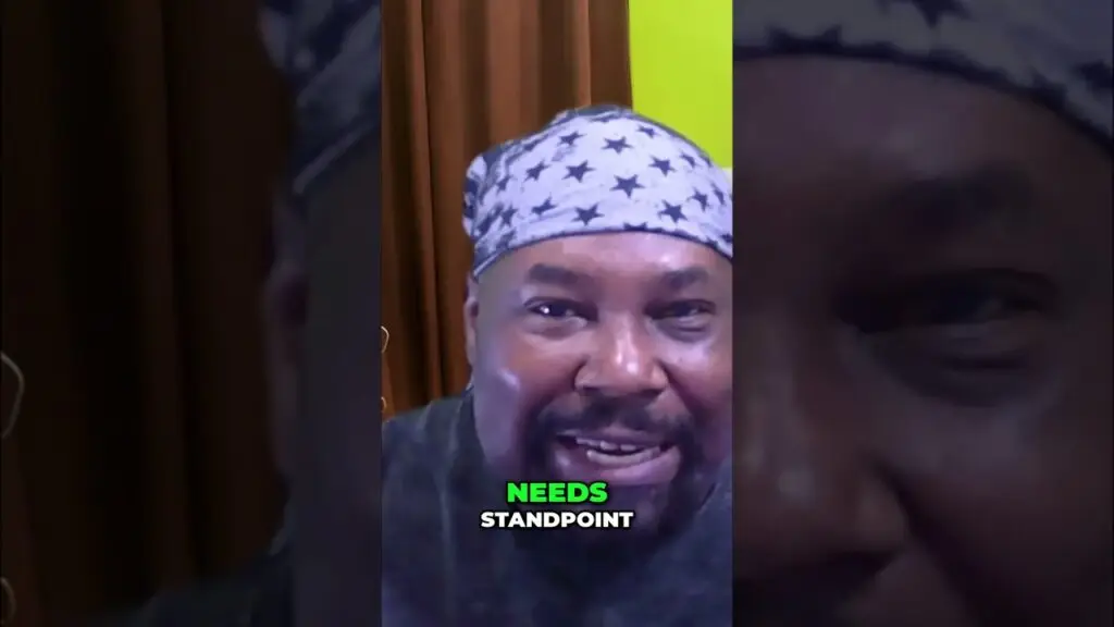 One Days Wage in China What Can It Really Buy shorts - Travel With Glen Man with a star-pattern bandana speaks to camera; green text overlay reads 'NEEDS' with 'STANDPOINT' beneath.