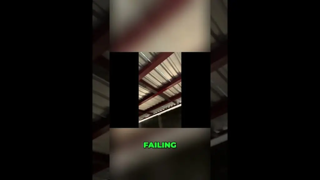 Video thumbnail: blurred warehouse ceiling with red steel beams and a green 'FAILING' caption at the bottom.