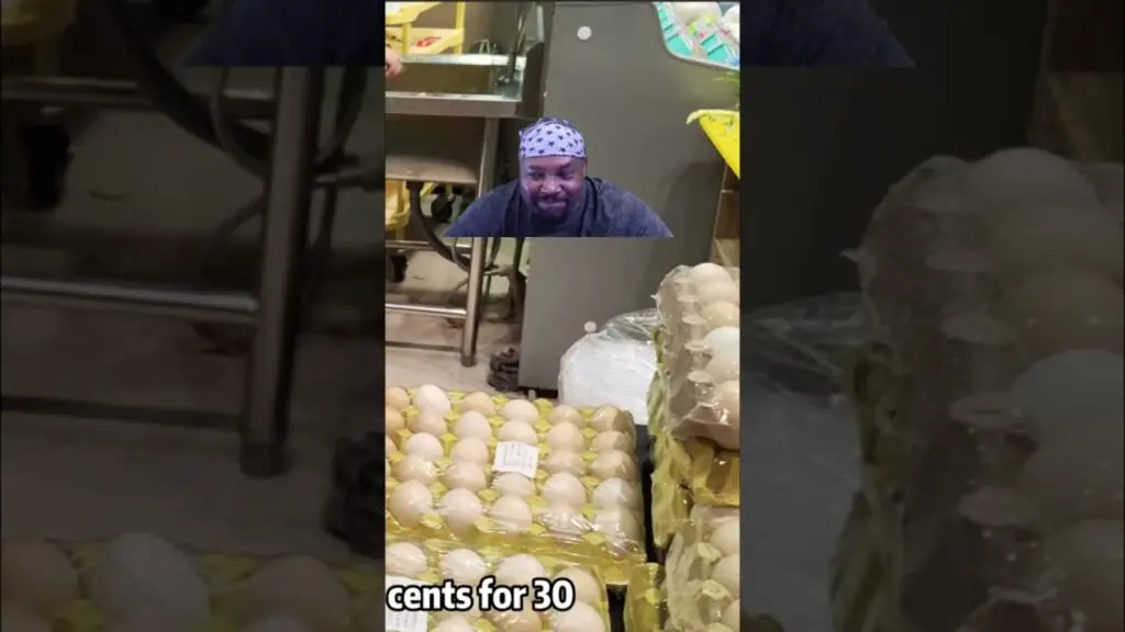 Egg Crisis in US See Unrefrigerated Eggs shorts - Travel With Glen Man in a blue bandana at a grocery store, with stacked egg cartons in front and a caption that says 'cents for 30'