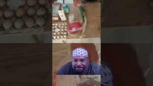 Fridge Full My Massive Grocery Haul Revealed shorts - Travel With Glen - Travel With Glen Collage image: groceries on a wooden table (eggs, milk, watermelon slices, vegetables) with a man wearing a star-pattern bandana in a video-frame panel below.