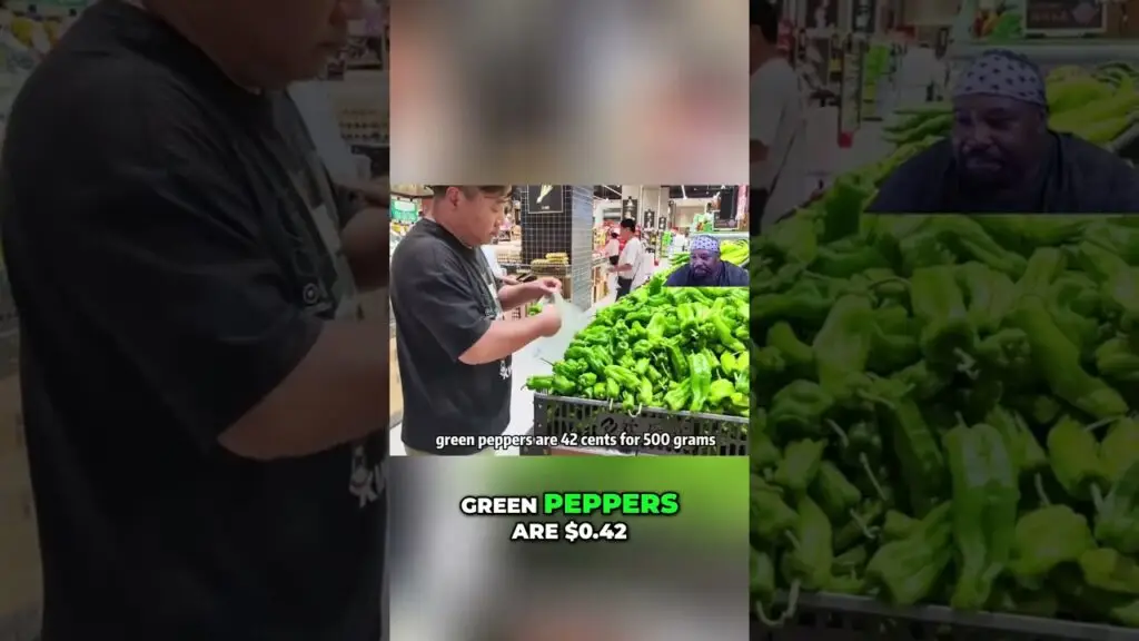 In a grocery store, a man checks green peppers with the price tag showing 42¢ for 500 g.